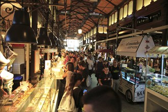 Customers inside Mercado de San Miguel market, Madrid city centre, Spain, Europe