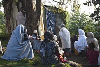 Orthodox christian persons waiting their turn to get rid of evil spirits, Tigray state, Ethiopia.