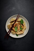 Japanese fried dumplings, gyoza, sesame seeds, top view, no people