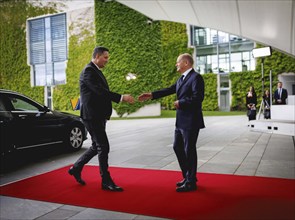 (R-L) Olaf Scholz, Federal Chancellor, receives Denis Becirovic, Chairman of the State Presidency