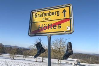 Rubber boots on the town sign: Silent protests by Bavarian farmers, Höfles, Upper Franconia,