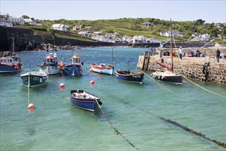 Fishing boats in the harbour at Coverack, Lizard Peninsula, Cornwall, England, UK