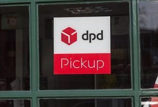 Sign for DPD Pickup, High Street, Marlborough, Wiltshire, England, UK