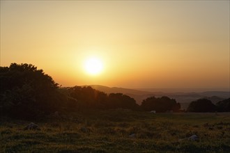 Sunset over mountain range, Sierras Subbeticas Natural Park, near Zuheros, Cordoba province,