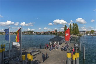 Immenstaad on Lake Constance, townscape, jetty, flags, name plate, blue sky, Baden-Württemberg,