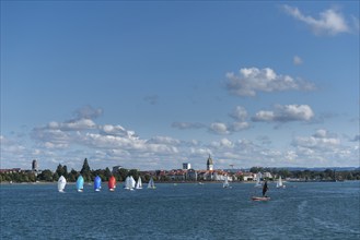 Cityscape, dinghies with spinnaker, Friedrichshafen on Lake Constance, Baden-Württemberg, Germany,