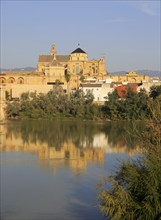 River Rio Guadalquivir and historic Mezquita cathedral buildings, Great Mosque, Cordoba, Spain,