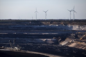 Garzweiler open-cast lignite mine with spreaders and wind turbines in the background, Jüchen, North