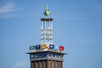 The old trade fair tower of the Cologne Exhibition Centre, with RTL logo, at the headquarters of