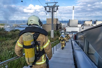 CopenHill, waste incineration plant and artificial ski slope, firefighters under respiratory