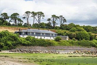 House over River Emme and Red Cove, Mothecombe, Plymouth, South Devon, England, United Kingdom,