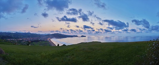 Sunset at the Atlantic coast in summer on the way to Zarautz at the Camino del Norte, coastal path,