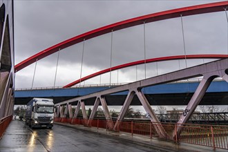 Dilapidated A42 motorway bridge (red arches) over the Rhine-Herne Canal, with massive structural