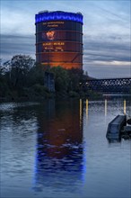 Neue Mitte Oberhausen, Gasometer exhibition hall, after renovation, Rhine-Herne Canal, evening