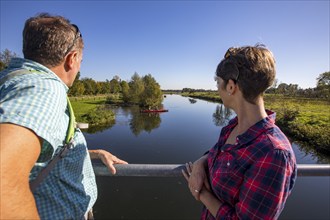 Hikers in the Steverauen Olfen, a renaturalised floodplain landscape and local recreation area in