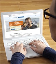 Symbolic image of organ donation register, person informs himself about the new online register for