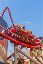 Park guests riding the Hollywood Rip Ride Rockit roller coaster at Universal Studios in Orlando,