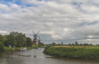 Twin mills, Greetsiel, Krummhörn, East Frisia, Lower Saxony, Germany, Europe