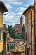 Old town with view of Basilica di San Clemente, historical, building, alley, Siena, Tuscany, Italy,