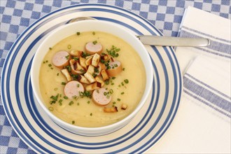 Swabian cuisine, potato soup with string sausages and pretzel croutons, hearty, savoury, typical