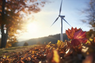 Colorful autumn leaves and wind energy turbine in blurry background. KI generiert, generiert AI