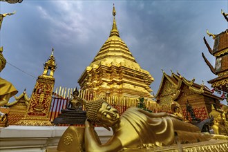 Reclining Buddha and Golden Chedi of the Buddhist temple complex Wat Phra That Doi Suthep, landmark