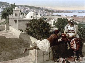 Moorish Woman and Child on a Terrace, Algiers, Algeria, ca 1890, Historic, digitally restored