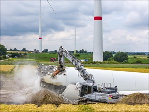 Demolished tower of a 20 year old wind turbine, in the Werl wind farm, 5 old Enercon E-66 turbines