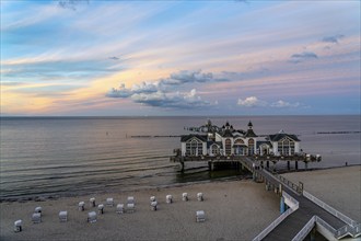 The pier of Sellin, evening mood, sunset, 394 metres long, with restaurant, jetty, beach chairs,