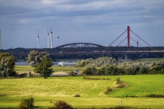 Rhine at Duisburg-Beeckerwerth, view across the Rhine meadows to the Haus Knipp railway bridge and