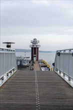 Jetty with lighthouse on Lake Plau, Plau am See, Mecklenburg-Western Pomerania, Germany, Europe