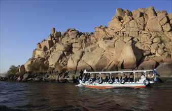 Tourist boat, excursion boat on the way to Agilkia Island, Nile near Aswan, Africa, Upper Egypt,