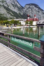 Pilgrimage church St. Bartholomä am Königssee with inscription on the jetty, Berchtesgaden National