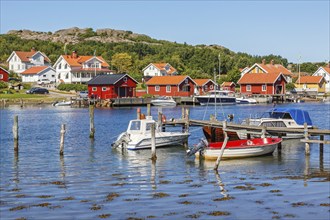 Boats at the jetty in an old fishing village on the Swedish west coast, Hamburgsund, Bohuslän,