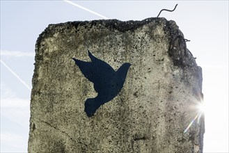 Monument, part of the Berlin Wall with dove of peace, Schengen, Canton of Remich, Luxembourg,