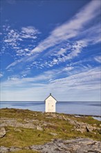 Small white hut on the island of Andoya, Vesterålen, Norway, Europe