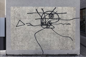 Abstract figure with legs, stick figure, line drawing by street artist Harald Naegeli, sprayer from