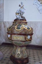 Baptismal font in the baroque St Martin's Church, organ from 1768, Riegel am Kaiserstuhl,