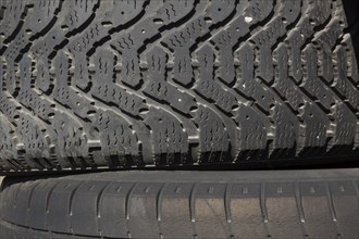 Close-up of threads on black rubber truck tires, Quebec, Canada, North America