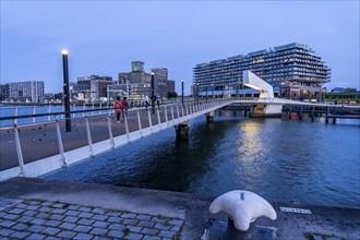 The former Fenix warehouse, left, from 1923, destroyed in the war, renovated in 2019, converted