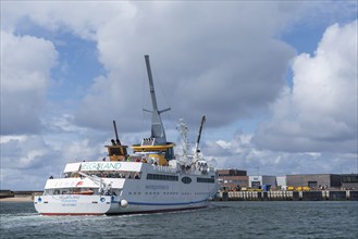 Helgoland island, arrival of the seaside resort ship Helgoland, blue sky, North Sea, Pinneberg