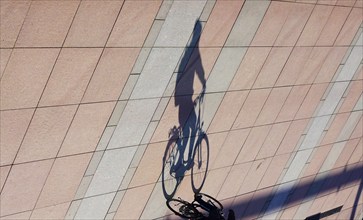 Cyclist with shadow, Winter, Saxony, Germany, Europe