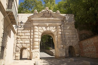 Historic archway spanning road, Puerta de los Granadas, Granada, Spain, Europe