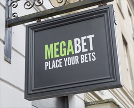 Close up of wall mounted Megabet betting shop sign, 'Place your Bets', Devizes, Wiltshire, England,