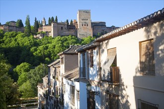 Cuesta de la Victoria street in the Albaicin district, Granada, Spain view over to the Alhambra