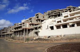 Concrete shells of uncompleted housing in the Castillo development, Caleta de Fuste, Fuerteventura,