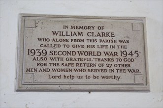 Village second world war memorial to fallen, Saint Andrew church, Westhall, Suffolk, England, UK