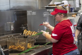 Romulus, Michigan USA, 27 August 2024, Workers filled fast food orders as Sheetz opened its first