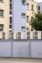 Heat pumps in a residential area, multi-family houses are supplied with heating, cooling and