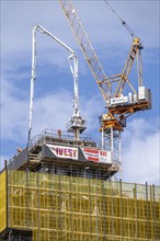 Concrete pump on a construction site of a new office building, in the city centre of Rotterdam,